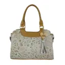 ANA PIEL FLORES MUÑEQUEADO SHEDRON/ORO